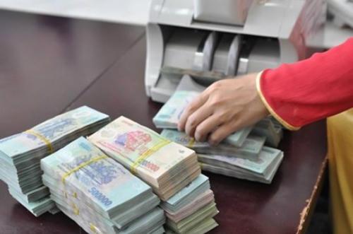Giao dịch rút tiền mặt với Kho bạc Nhà nước cấp tỉnh từ 200 triệu đồng trở lên sẽ phải đăng ký trước một ngày làm việc. Ảnh: Hoài Thu