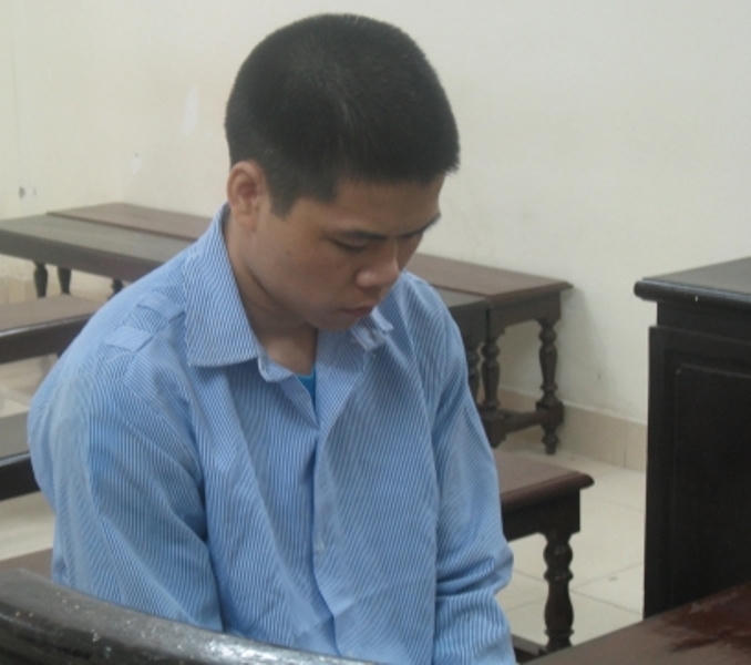Tang Yuan Xun trước vành móng ngựa trong phiên xét xử.