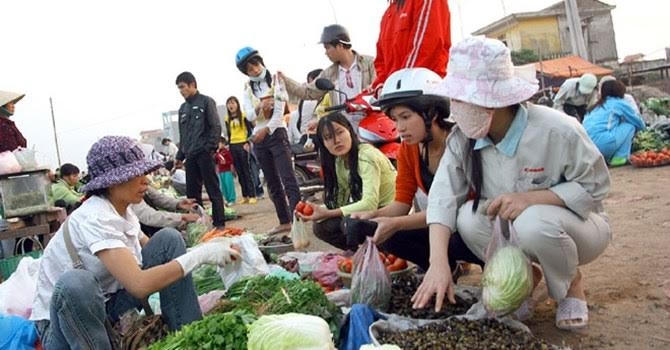 Đời sống người lao động sẽ được cải thiện khi lương cơ sở tăng.