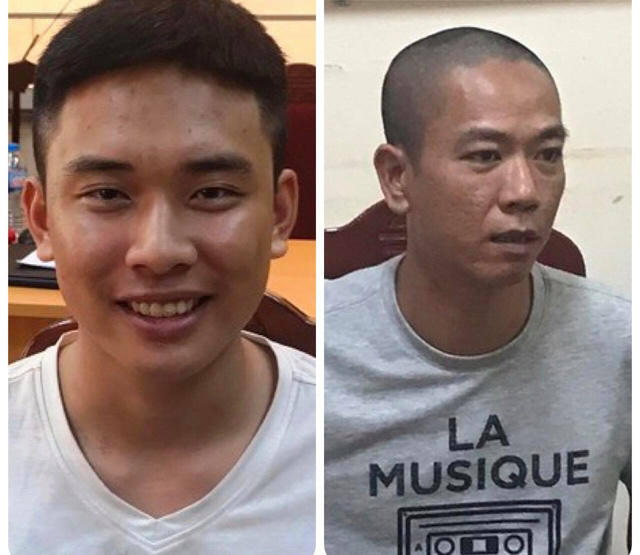 Hai nghi phạm Mạnh (bên trái) và Ngọc tại cơ quan công an .