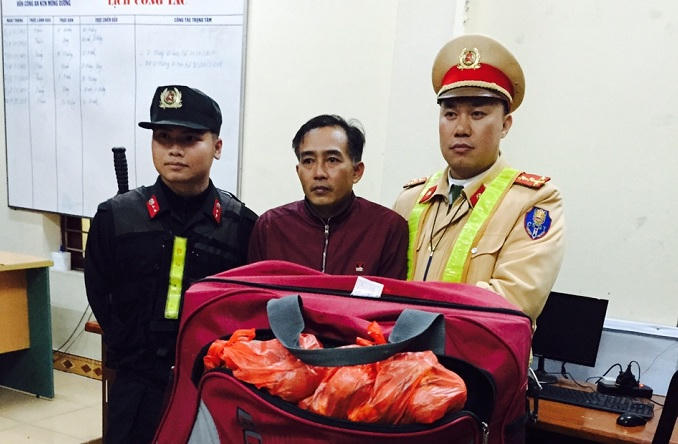 Đối tượng Trần Văn Tình tại cơ quan chức năng.