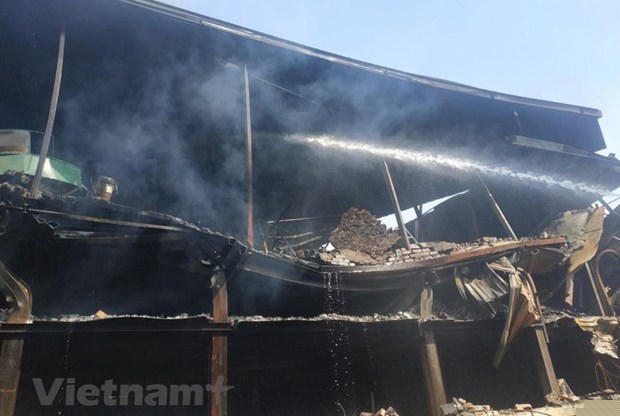 Hiện trường vụ cháy tại Công ty Rạng Đông. (Nguồn ảnh: Vietnam+).