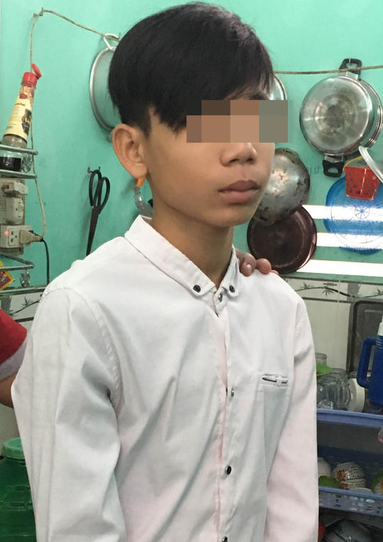 Nghi phạm Lê Bá Lâm lúc bị bắt.