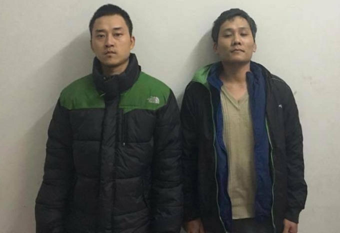 Hai đối tượng Nguyễn Anh Đức và Vũ Duy Thanh tại cơ quan công an.