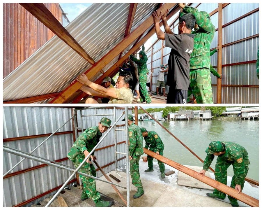 Cán bộ, chiến sĩ Đồn Biên phòng Đất Mũi phối hợp cùng chính quyền và Nhân dân dựng lại nhà cho bà Đào Thị Vân, thể hiện tinh thần gắn bó, sẻ chia với người dân nơi biên giới.