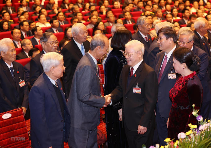 Tổng Bí thư, Chủ tịch nước Nguyễn Phú Trọng và Ủy viên Bộ Chính trị, Chủ tịch Quốc hội Nguyễn Thị Kim Ngân dự phiên khai mạc Đại hội. (Ảnh: TTXVN)