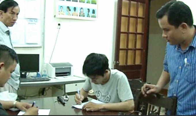 Lê Minh Quân tại cơ quan Công an. (Ảnh: PLVN)