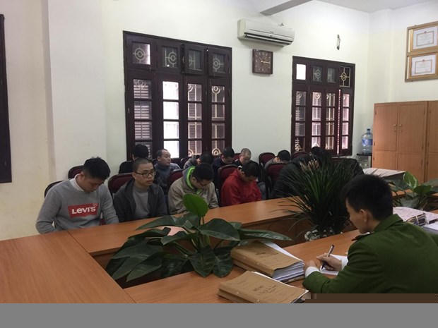 Một số đối tượng trong đường dây đánh bạc online khủng vừa bị Công an Cầu Giấy, Hà Nội triệt phá. (Ảnh: PV/Vietnam+)