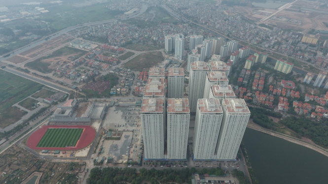 Toàn cảnh khu tổ hợp 12 tòa nhà cao tầng (nhìn từ xa và từ trên cao) của Tập đoàn Mường Thanh tại khu đô thị Linh Đàm - Ảnh: Việt Dũng