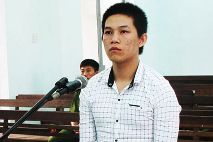 Bị cáo Nguyễn Quốc Thật tại phiên tòa. ( Ảnh: Báo Khánh Hòa).
