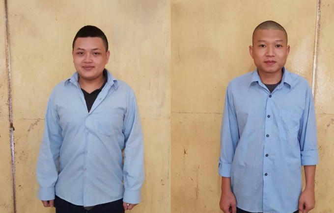 Vũ Thành Nam và Vương Quốc Anh tại cơ quan Công an.