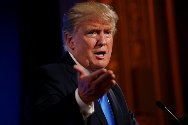 Tổng thống Trump dự họp báo với người đồng cấp tại Điện Elysee ở Paris ngày 13/7.(Ảnh: Reuters)