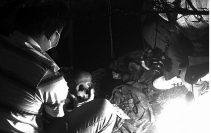 Hiện trường nơi phát hiện hài cốt của anh Thuỷ và chị Diễm trong hang đá trên núi Chứa Chan.