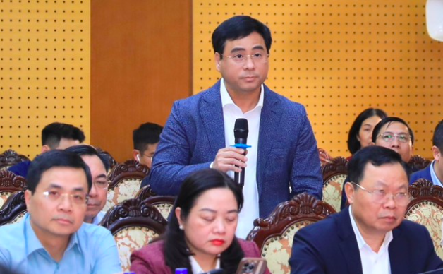 Chủ tịch UBND quận Hoàng Mai Nguyễn Minh Tâm phát biểu tại hội nghị.