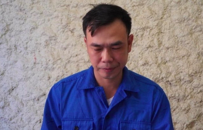Nguyễn Mạnh Tuân tại cơ quan điều tra. Ảnh: Công an cung cấp.