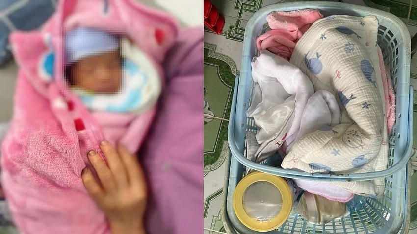 Bé trai bị bỏ rơi trước cửa nhà dân cùng tờ giấy viết tay. (Ảnh: Công an Cao Bằng).