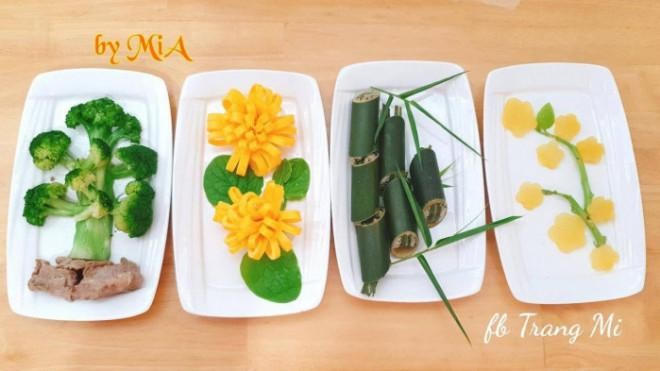 Mâm cỗ có đầy đủ hình ảnh tứ quý Tùng - Cúc - Trúc – Mai được FB Trang Mi chia sẻ. Ý tưởng mâm cỗ này xuất phát từ việc chị Trang Mi rất yêu thích bộ tranh Tứ Quý Tùng - Cúc - Trúc - Mai thể hiện sự luân chuyển của bốn mùa xuân, hạ, thu, đông. Sự vận động của thiên nhiên không chỉ đem lại may mắn cho con người mà còn là sự hy vọng, ước mong về một cuộc sống suôn sẻ, thịnh vượng.