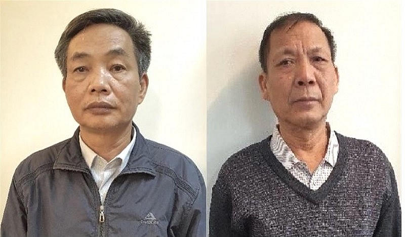 Bị can Đặng Ngọc Cầm (bên trái); Bị can Nguyễn Quốc Khánh (bên phải).