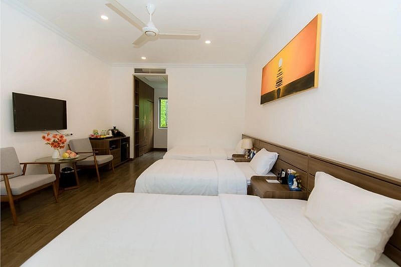 Không gian phòng Triple Garden bố trí 3 giường ngủ.