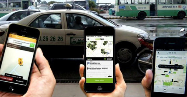 "Cuộc chiến" giữa taxi ứng dụng công nghệ kết nối và taxi truyền thống vẫn rất căng thẳng (Ảnh minh họa)