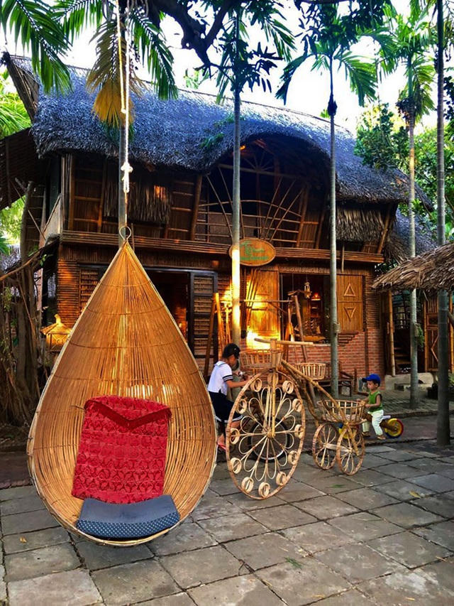 Ngôi nhà 2 tầng bằng tre và dừa mộc mạc ở Hội An (ảnh: HD).