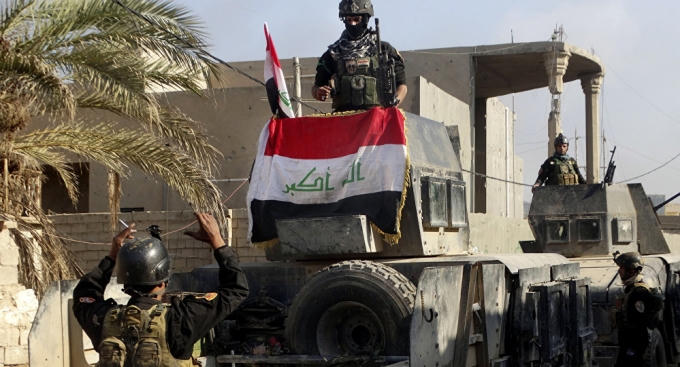 Iraq bắt nghi phạm Bộ trưởng tài chính của IS. (Ảnh: AP)