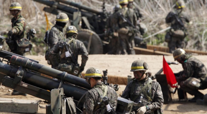 49 tiểu đoàn tham gia vào cuộc tập trận bắn đạn thật ngày18/8. (Ảnh: Reuters)
