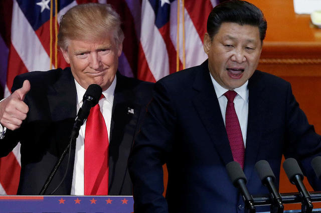 Tổng thống Mỹ Donald Trump (trái) và Chủ tịch Trung Quốc Tập Cận Bình (Ảnh: Getty)