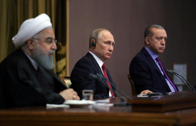 Tổng thống Nga Vladimir Putin (giữa) Tổng thống Iran Hassan Rouhani và Tổng thống Thổ Nhĩ Kỳ Tayyip Erdogan (Ảnh: Reuters)