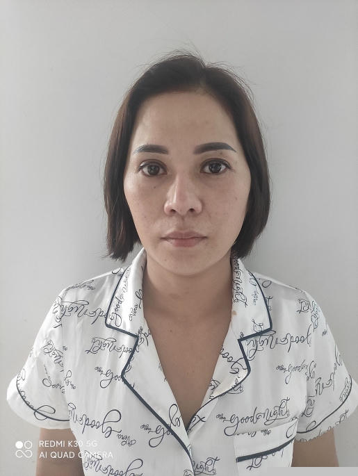 Nguyễn Thị Xiêm tại cơ quan công an.