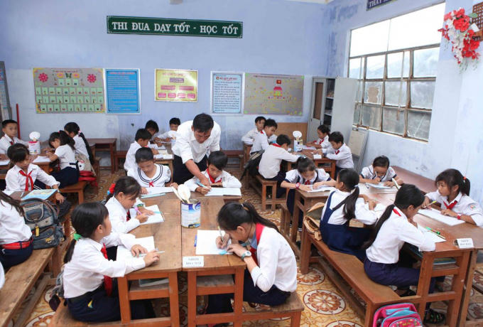 Với giáo dục phổ thông, nhiệm vụ năm 2019 là khẩn trương chuẩn bị điều kiện triển khai chương trình giáo dục phổ thông mới. (Nguồn: TTXVN)