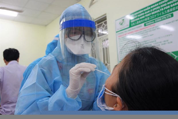 Xét nghiệm COVID-19. (Ảnh: Đinh Hằng/TTXVN)