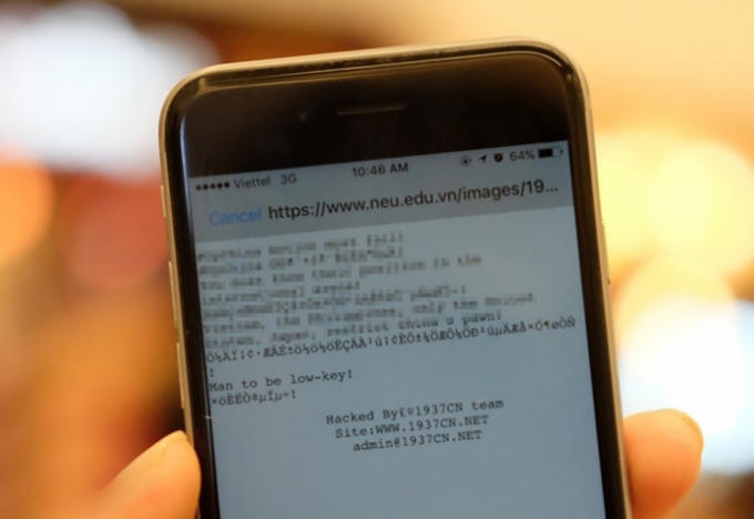 Website ĐH Kinh tế Quốc dân bị nhóm tin tặc Trung Quốc có tên 1937CN tấn công. (Ảnh: Zing News)