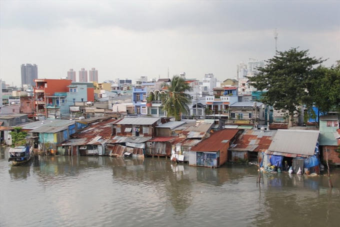 TPHCM còn 20.000 căn nhà trên và ven kênh, rạch cần phải tiếp tục di dời. Ảnh: M.Q