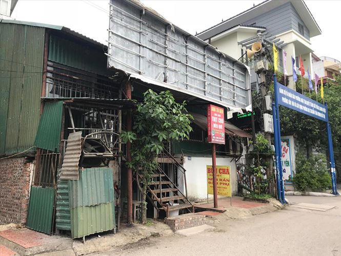 Vẻ ti&ecirc;u điều của qu&aacute;n thịt ch&oacute; nổi tiếng một thời tr&ecirc;n phố Nhật T&acirc;n. Ảnh: Trần Ho&agrave;ng