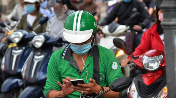 Nhiều tài xế công nghệ bỏ nghề vì thu nhập chạy xe không đủ trang trải cuộc sống. (Ảnh minh họa)