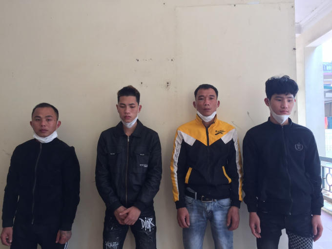 Các đối tượng tại cơ quan chức năng (từ trái qua phải: Long, Vũ, Huynh, Trường)