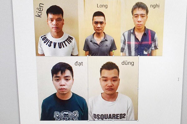 Nhóm đối tượng đang bị cơ quan công an bắt giữ.
