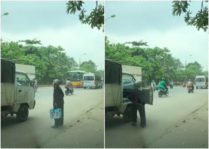 Cụ bà được tài xế xe tải cho đi nhờ quá giang - Ảnh cắt từ clip