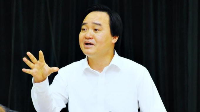 Bộ trưởng Phùng Xuân Nhạ phát biểu tại hội nghị sáng 6/8. Ảnh: Nguyễn Khang.