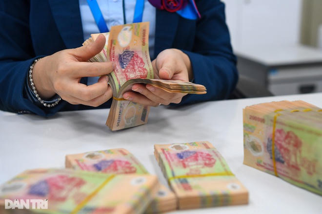 Tiền gửi không kỳ hạn tại một số ngân hàng đang giảm, có những nơi giảm gần 50% (Ảnh minh họa: Mạnh Quân).