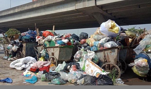 Mỗi ngày, trên địa bàn thành phố phát sinh từ 5.500- 6.000 tấn rác sinh hoạt.(Ảnh: P.V/Vietnam+).