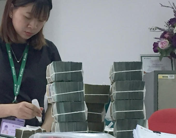 Tổng mức nợ xấu trong hệ thống Tổ chức tín dụng vẫn còn ở mức cao - Ảnh: Tạ Tôn