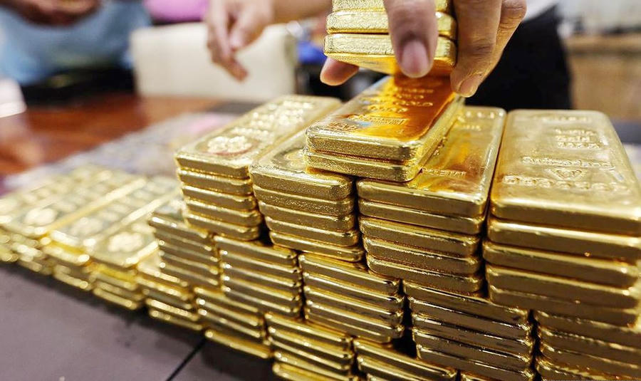 Giá vàng thế giới có thể tiếp tục tăng giảm xung quanh ngưỡng 1.400 USD/oz. Ảnh: Minh Ngọc.