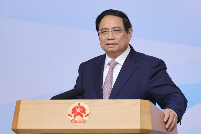 Thủ tướng Phạm Minh Chính phát biểu tại Hội nghị về thành lập Trung tâm tài chính quốc tế tại Việt Nam - Ảnh: VGP