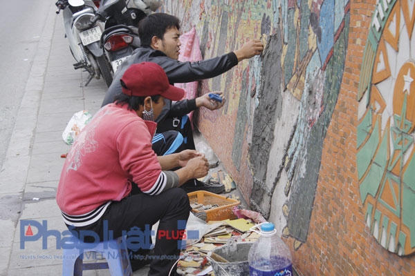 Những người thợ miệt mài với công việc của mình để hoàn thành trước tết Nguyên đán 2016. Ảnh: Như Trương.