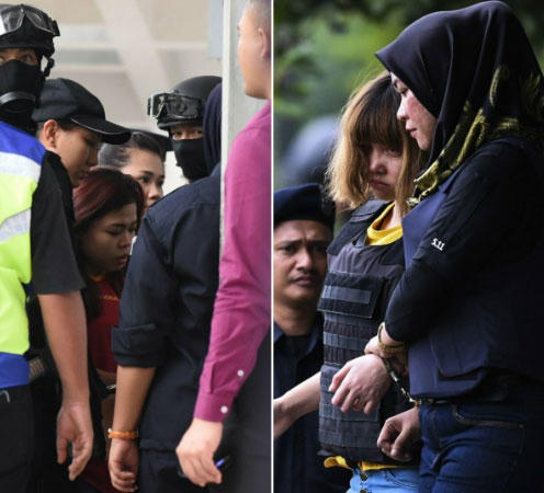 Siti Aishah (trái) và Đoàn Thị Hương (Ảnh: AFP)