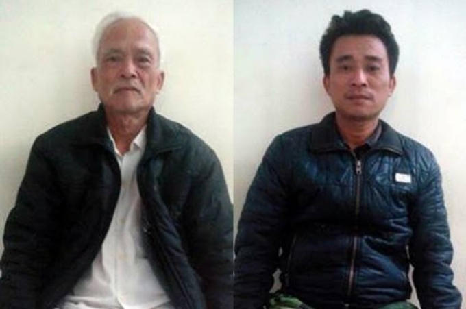 Hai cha con ông Đức, ông Đạo tại cơ quan Công an.