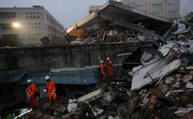 Hiện trường đổ nát sau vụ lở đất. (Ảnh:AFP)