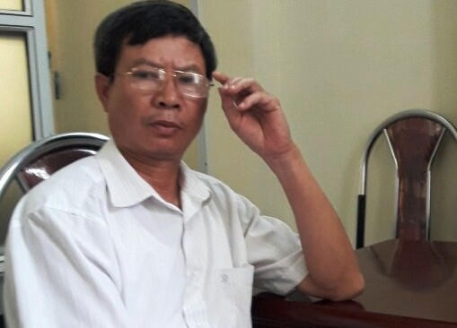 Chủ tịch UBND xã Yên Thịnh Thiều Quang Huê thừa nhận việc bút phê là sai quy định (Ảnh: A.T)